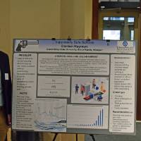 Darrien Hayman with his reseach poster